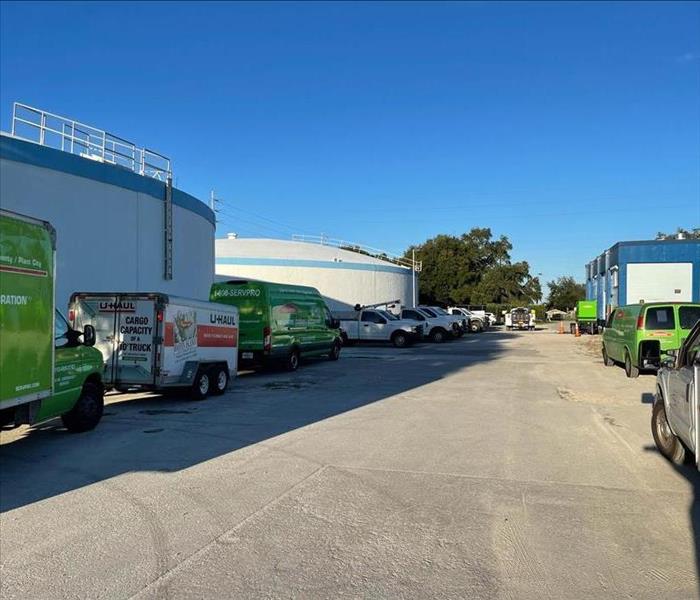 SERVPRO trucks and vans parked outside loss.
