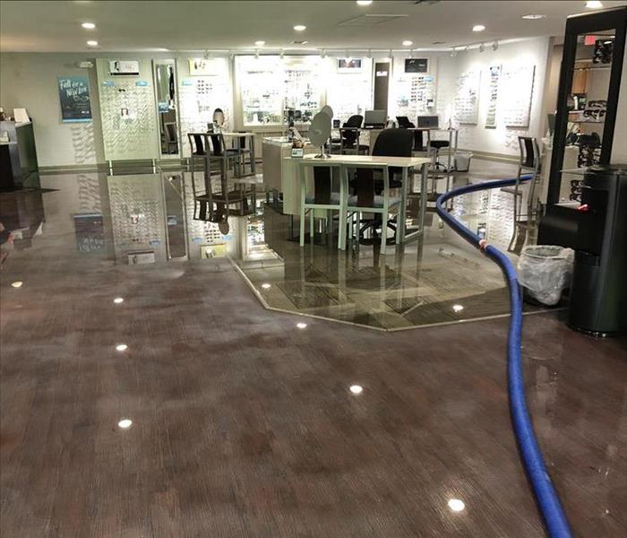 Business with standing water after a hurricane.
